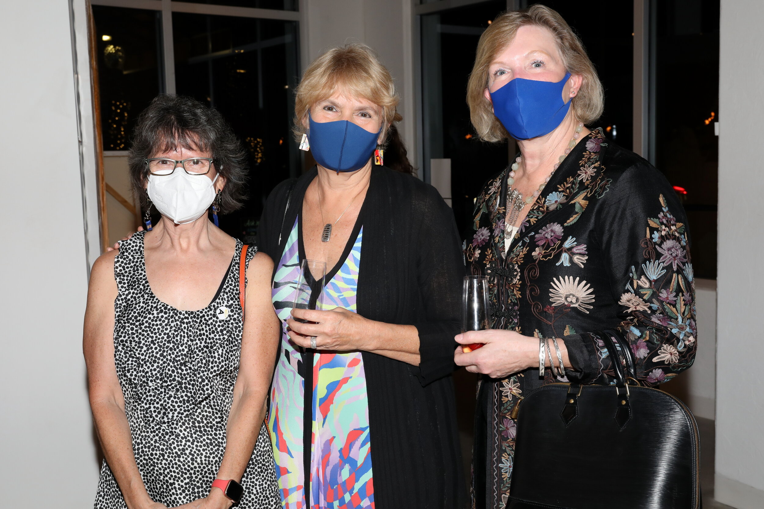Founders Teresa Carson, Leslie Butterfield and Cynthia Burnell celebrate receiving the Halo Arts Fellowship Award at Lignin Gallery on February 12, 2021.